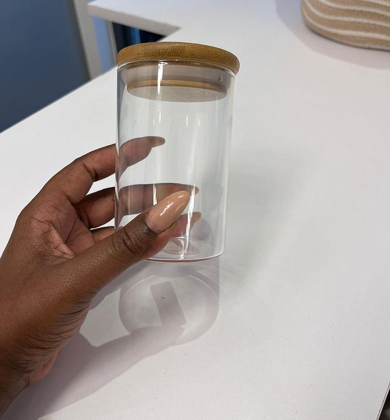Round mini glass jar with an airtight bamboo lid image